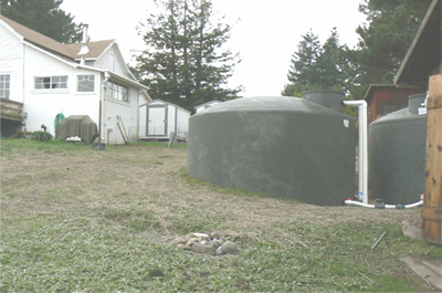 roof plumbing leading to rainwater catchment tank